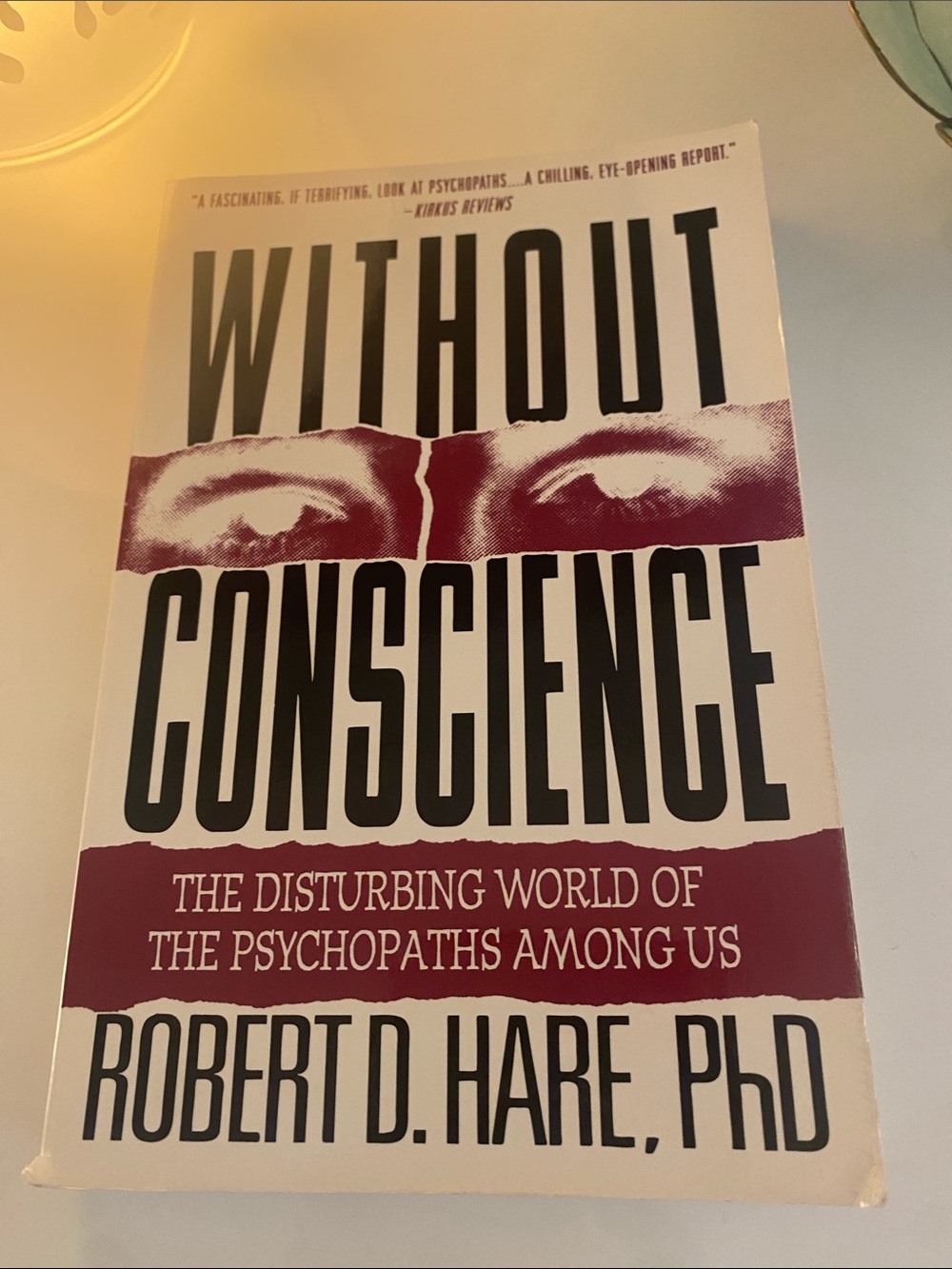 Robert D. Hare "Without Conscience" Paperback Book - White and Burgundy